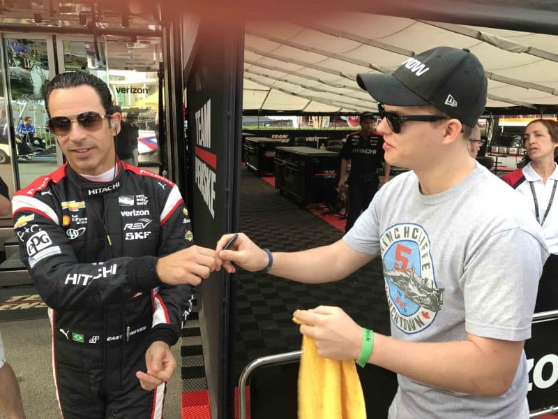 Helio Castroneves and fan, St. Pete Indycar race